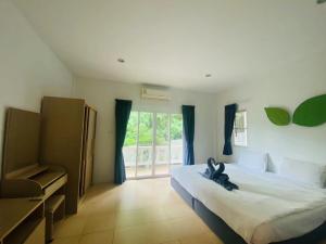 Postel nebo postele na pokoji v ubytování Z&Z Resort