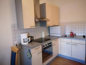 Kuchyň nebo kuchyňský kout v ubytování Ferienwohnung Maris