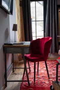 TV a/nebo společenská místnost v ubytování A Nouste chambres d'hotes et gite ONLY ADULTS