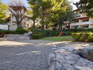 Vonkajšia záhrada v ubytovaní Aparthotel Plat