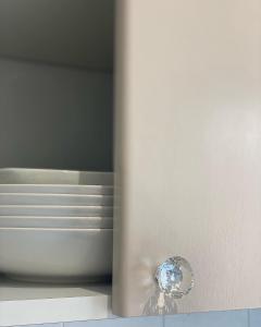 a close up of a door knob on a drawer at Dodo home beach in Lavagna