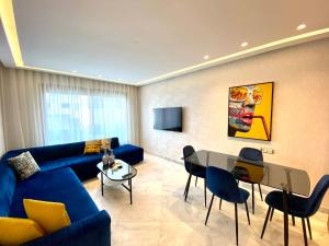 Televiisor ja/või meelelahutuskeskus majutusasutuses Anfa Living 11 - Classy & Élégant near the Sea