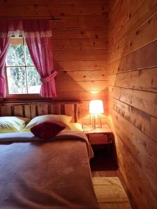 Un pat sau paturi într-o cameră la Apartments Zafran