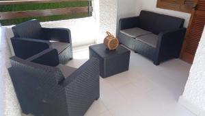 Posedenie v ubytovaní Fantástico Apartamento a 50m de playa Colon y Paseo