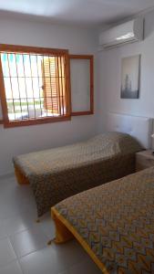 Posteľ alebo postele v izbe v ubytovaní Fantástico Apartamento a 50m de playa Colon y Paseo