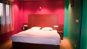 Cama ou camas em um quarto em Malar inn