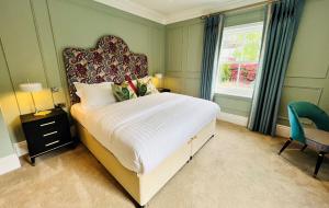 Letto o letti in una camera di Silken Thomas Accommodation