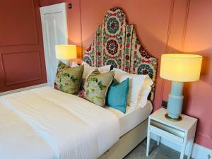 Letto o letti in una camera di Silken Thomas Accommodation
