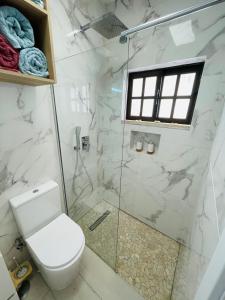Ванна кімната в Tiny Beach House Armação de Pêra