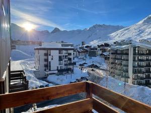 a view of a city in the snow from a balcony at Tignes 2100, tout confort in Tignes