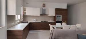 Cuina o zona de cuina de Lorenza Letting Maisonette