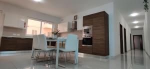 Cuina o zona de cuina de Lorenza Letting Maisonette