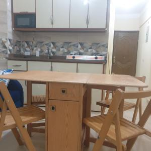 A kitchen or kitchenette at شاليهات للعائلات بمنتجع ريتال فيو الساحل الشمالى