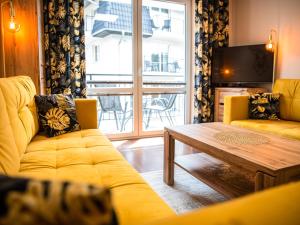 Posedenie v ubytovaní Markowe Apartamenty Złoty Park