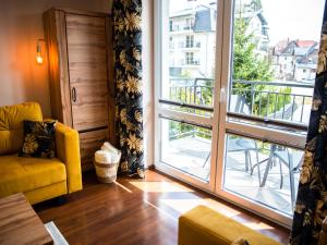Posedenie v ubytovaní Markowe Apartamenty Złoty Park
