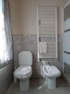 Kúpeľňa v ubytovaní Appartamento La Torretta
