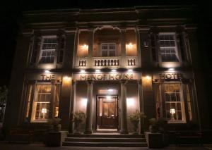 a building with the moorhouse at night at Manor House Hotel, Cockermouth in Cockermouth