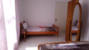 Posteľ alebo postele v izbe v ubytovaní Vacation house in Stroggili