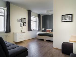 Postel nebo postele na pokoji v ubytování Salt Guesthouse