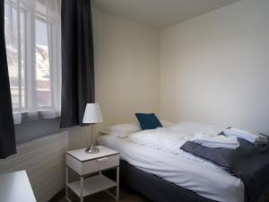 Postel nebo postele na pokoji v ubytování Salt Guesthouse