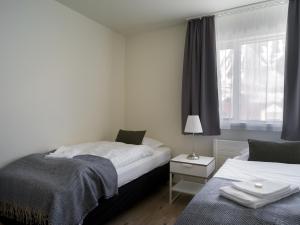 Postel nebo postele na pokoji v ubytování Salt Guesthouse