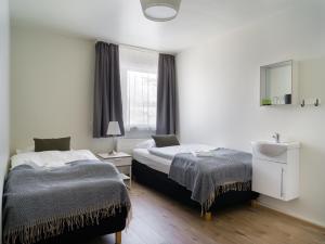 Postel nebo postele na pokoji v ubytování Salt Guesthouse