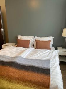 Postel nebo postele na pokoji v ubytování Salt Guesthouse