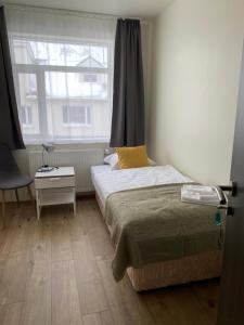 Postel nebo postele na pokoji v ubytování Salt Guesthouse