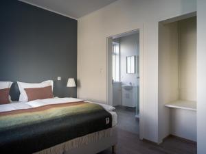 Postel nebo postele na pokoji v ubytování Salt Guesthouse