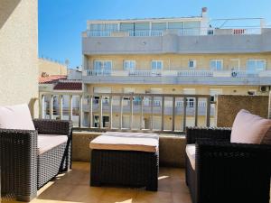 A balcony or terrace at PORT ROYAL B1 2-2 - Apartamento con vistas al canal - cerca playa