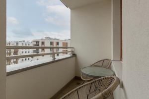 Balkón alebo terasa v ubytovaní Apartament Na Woli Sowińskiego by Noclegi Renters