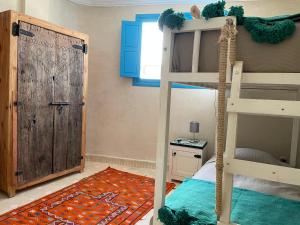 Llit o llits en una habitació de Taghazout Ocean View