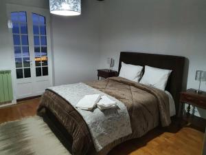 Cama ou camas em um quarto em Quinta Viela Principal mais 31 fotos