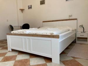 Postel nebo postele na pokoji v ubytování Penzion U Thuje