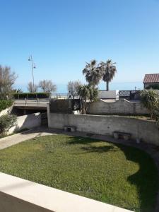 a park with a bridge and some grass at Casa a 20 metri dal mare! in Fossacesia