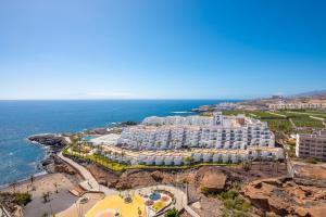 an aerial view of a resort and the ocean at 1316 Ocean View Studio Paraiso in Playa Paraiso