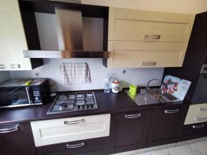 Kuchyň nebo kuchyňský kout v ubytování Scala dei Turchi Apartment