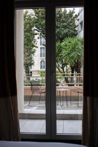 Uma varanda ou terraço em Hotel Molière