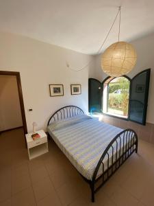 A bed or beds in a room at Casaleaurelia