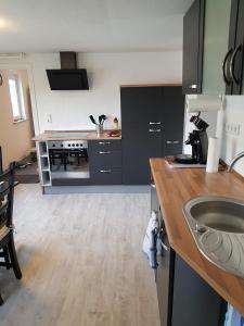 Kuchyň nebo kuchyňský kout v ubytování Ferienwohnung an der Schelde