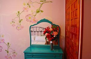 A bed or beds in a room at L'arome de Ainsa
