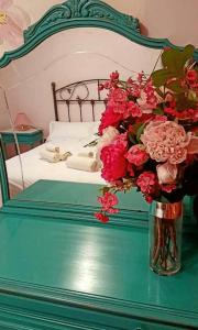 A bed or beds in a room at L'arome de Ainsa