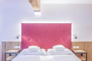 Voodi või voodid majutusasutuse Hotel Residence Rose toas