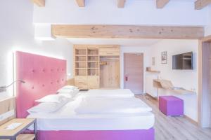 Voodi või voodid majutusasutuse Hotel Residence Rose toas
