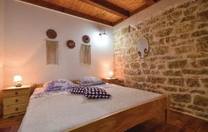 Posteľ alebo postele v izbe v ubytovaní Stone villa Pietra with pool