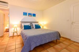 Postel nebo postele na pokoji v ubytování DHM - Domaine Habitation Merveilleuse