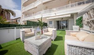 A seating area at R126 Beachfront Apartment Sant Salvador