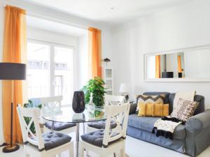 a living room with a table and a couch at Your BEST EXPERIENCE in old Madrid - Sol in Madrid