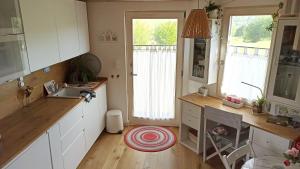 Kuchnia lub aneks kuchenny w obiekcie Mini casa con jardín