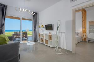 A bed or beds in a room at Niva Kamiros Apartments